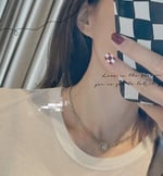 Chanel Logo Cc Necklace In Gold Metal And Silver Resin