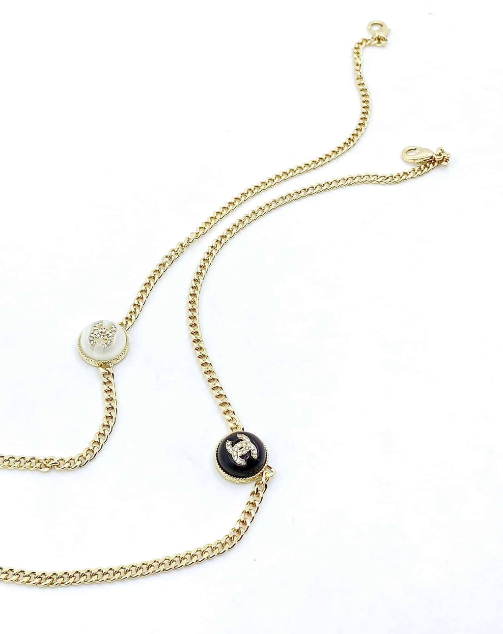 Chanel Logo Cc Necklace In Gold Metal Black Resin