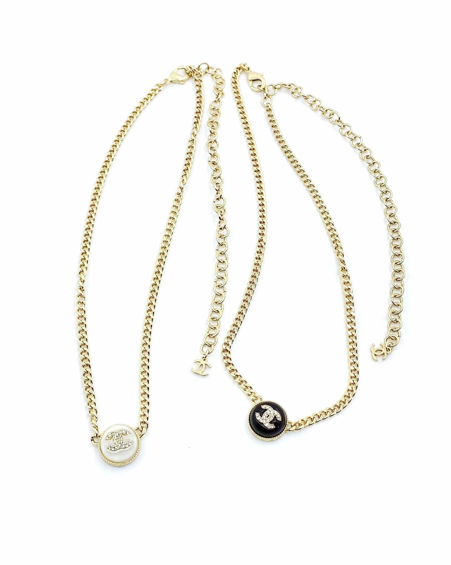 Chanel Logo Cc Necklace In Gold Metal And Silver Resin