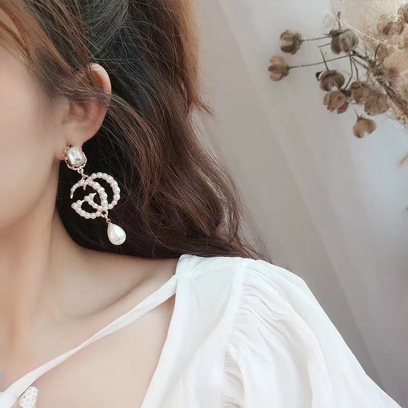 Gucci Pearl Gg Drop Earrings In Gold